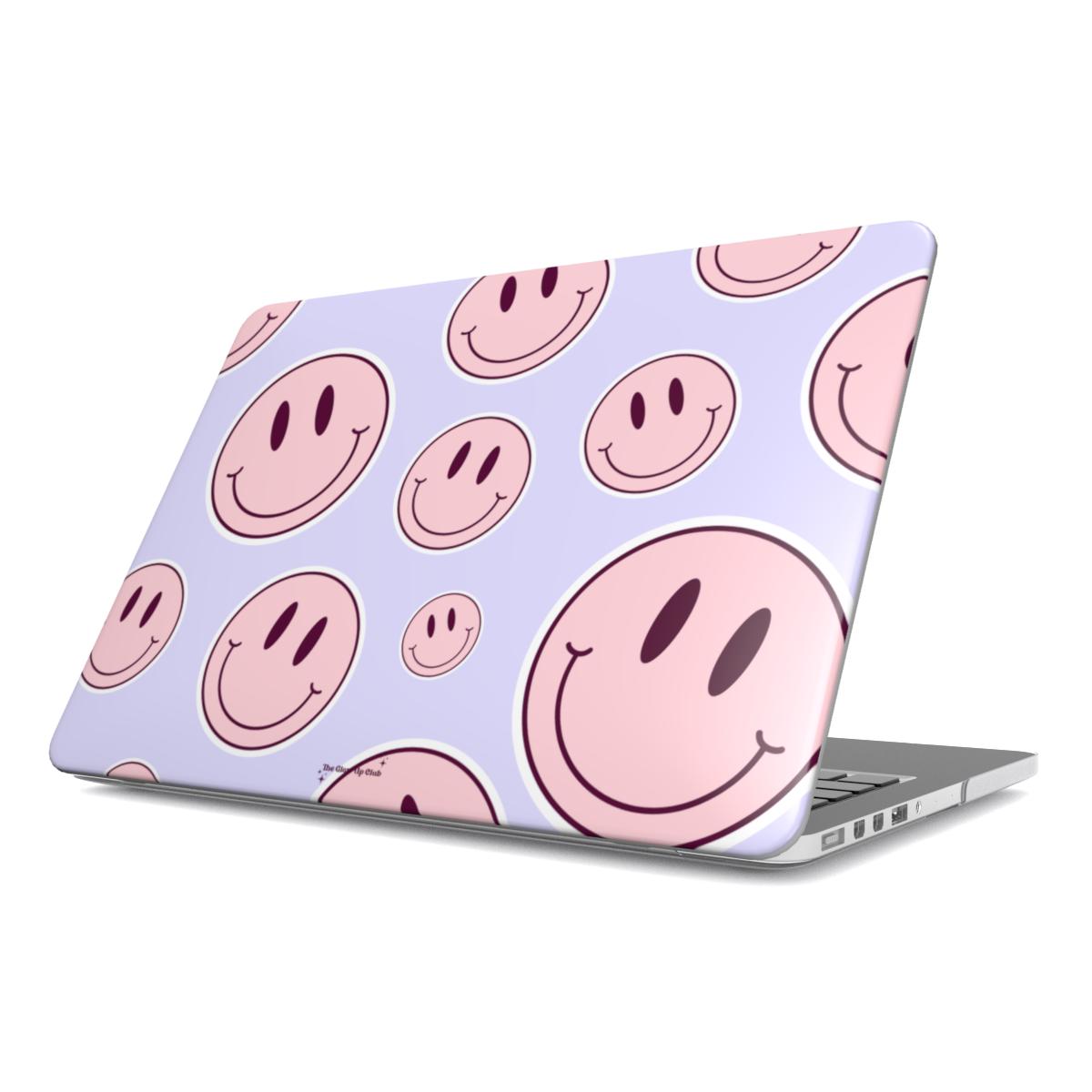 Smiley faces pink on purple MacBook Case